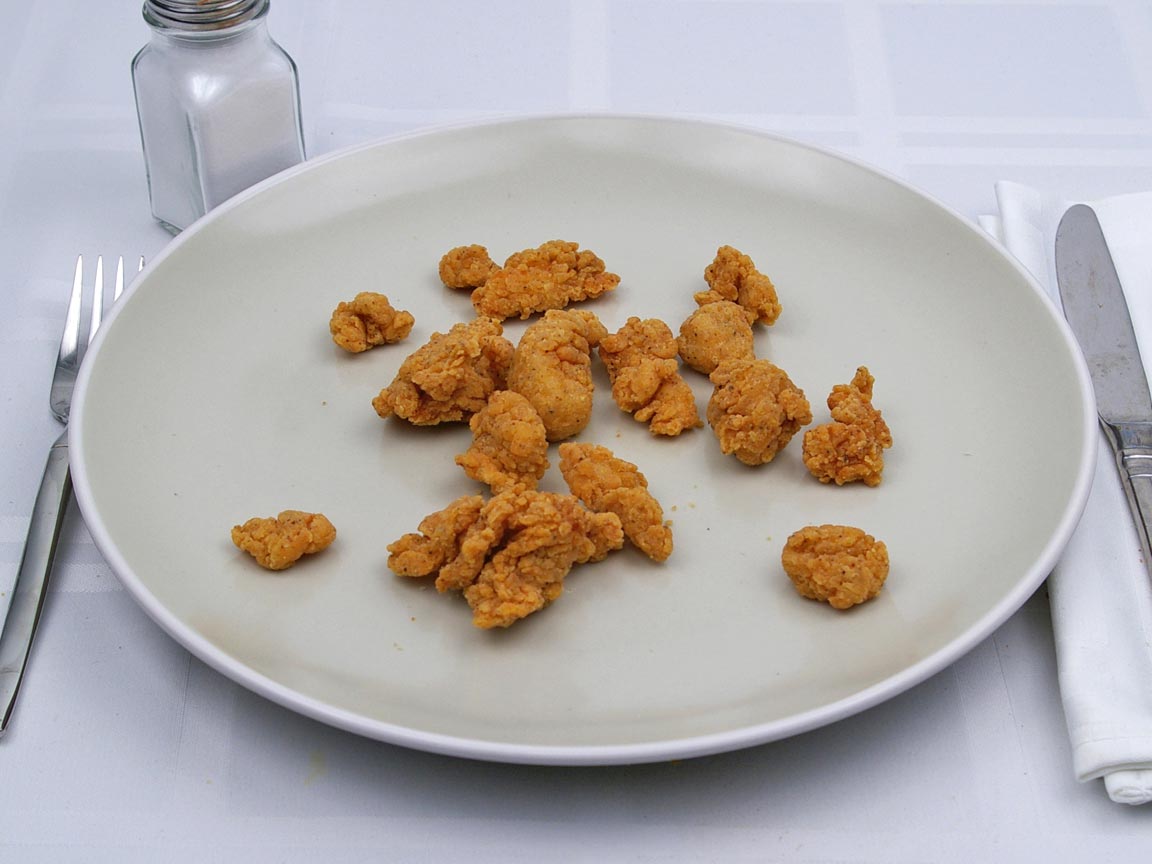 Calories in 0.5 large of Kentucky Fried Chicken - Popcorn Nuggets