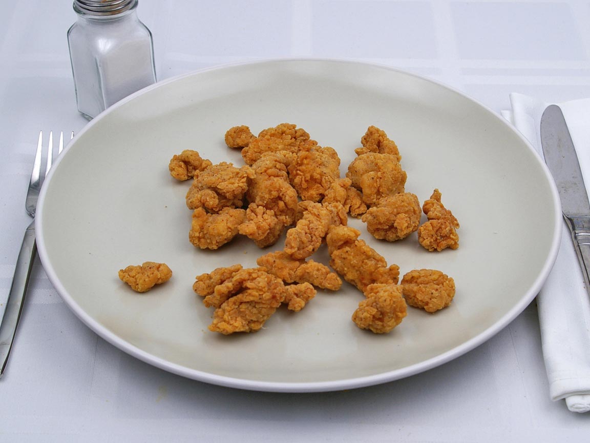 Calories in 0.75 large of Kentucky Fried Chicken - Popcorn Nuggets