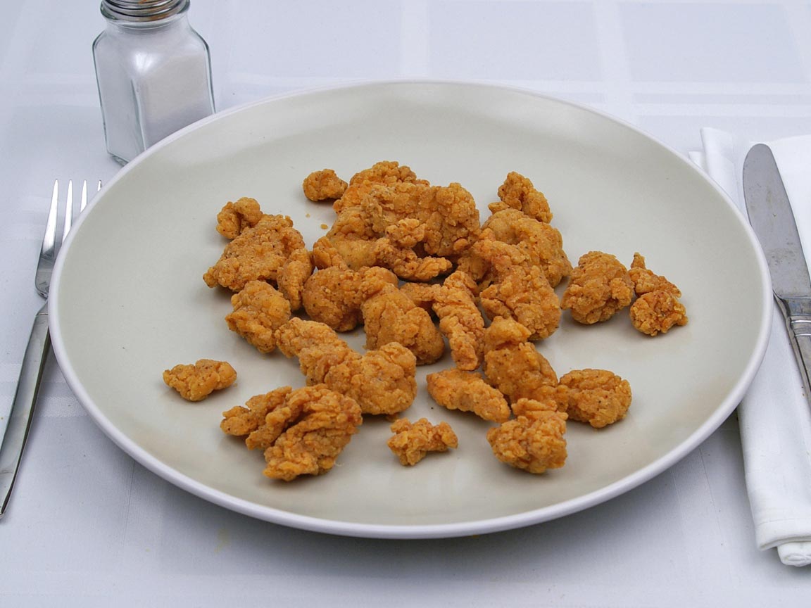 Calories in 1 large of Kentucky Fried Chicken - Popcorn Nuggets