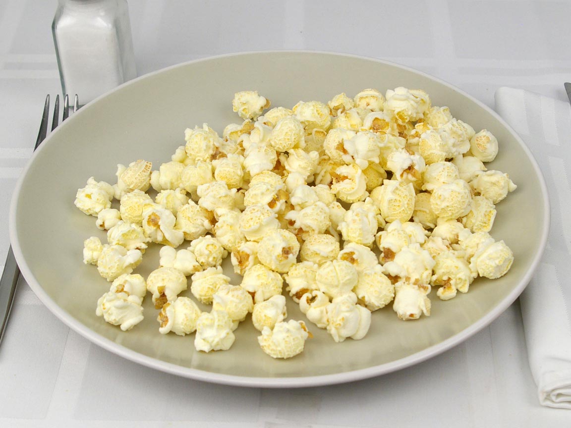 Calories in 28 grams of Popcornopolis White Cheddar Popcorn