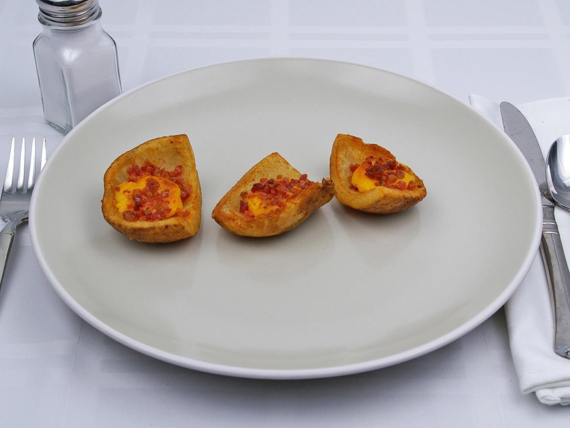 Calories in 93 grams of Potato Skins - Bacon and Cheddar