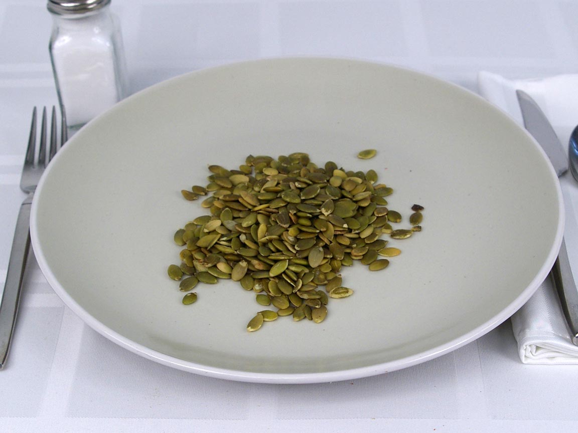 Calories in 0.38 cup(s) of Pumpkin Seeds Shelled