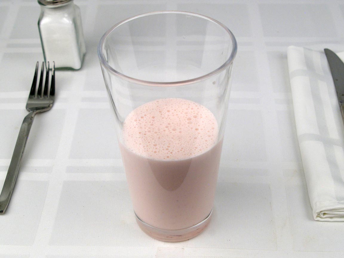 Calories in 10 fl oz(s) of Strawberry Milkshake