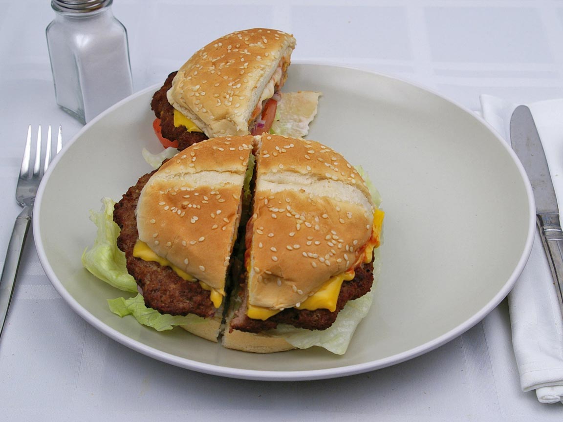 Calories in 1.5 burger(s) of Carl's Jr - Original Six Dollar ThickBurger 