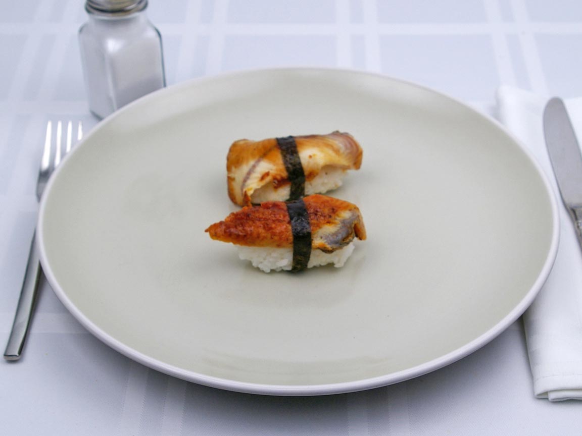 Calories in 2 piece(s) of Sushi - Eel Nigiri