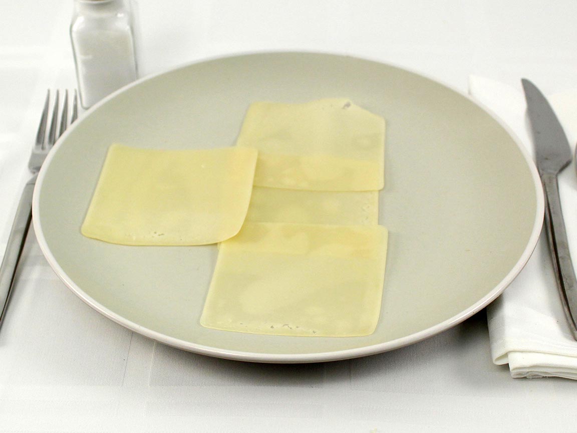 Calories in 4 slice(s) of Swiss Cheese Thin Slice