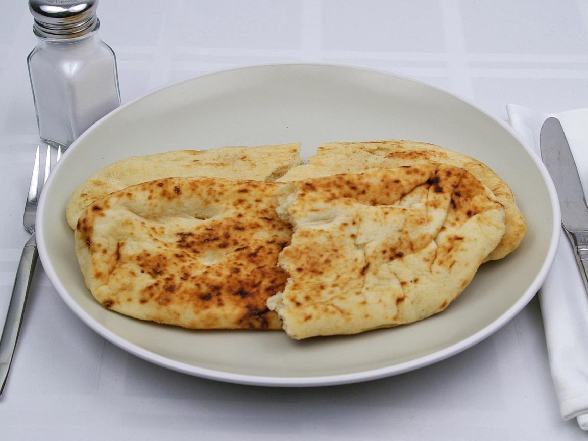 Calories in 2 piece(s) of Tandoori Naan Bread