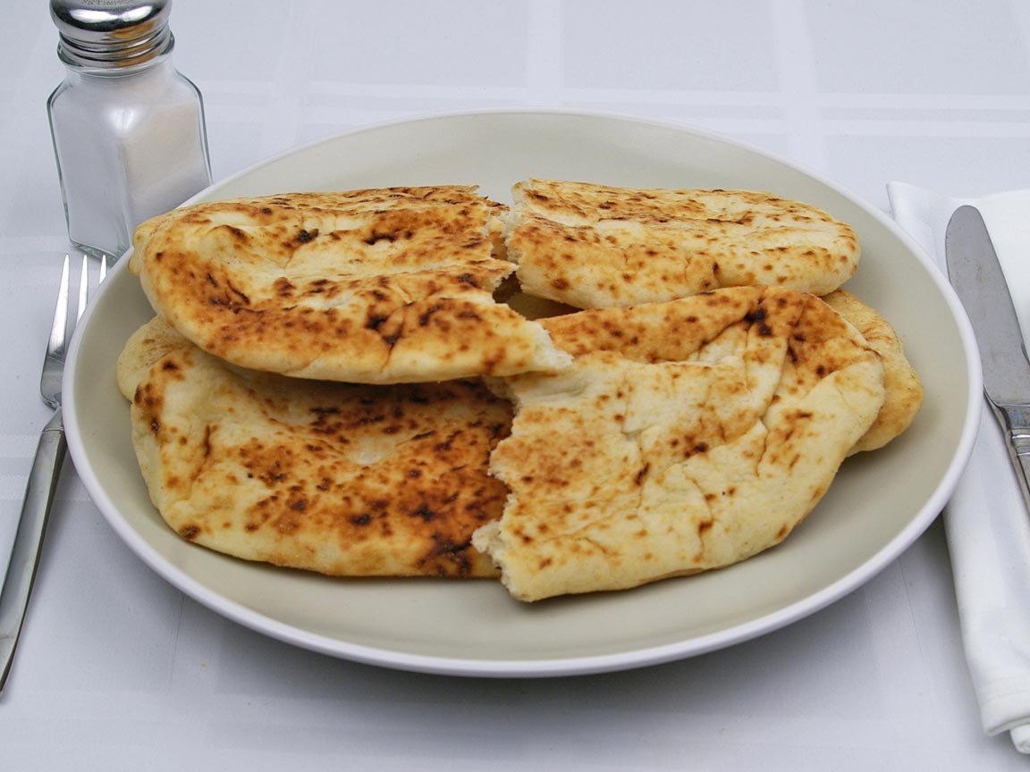Calories in 3.5 piece(s) of Tandoori Naan Bread