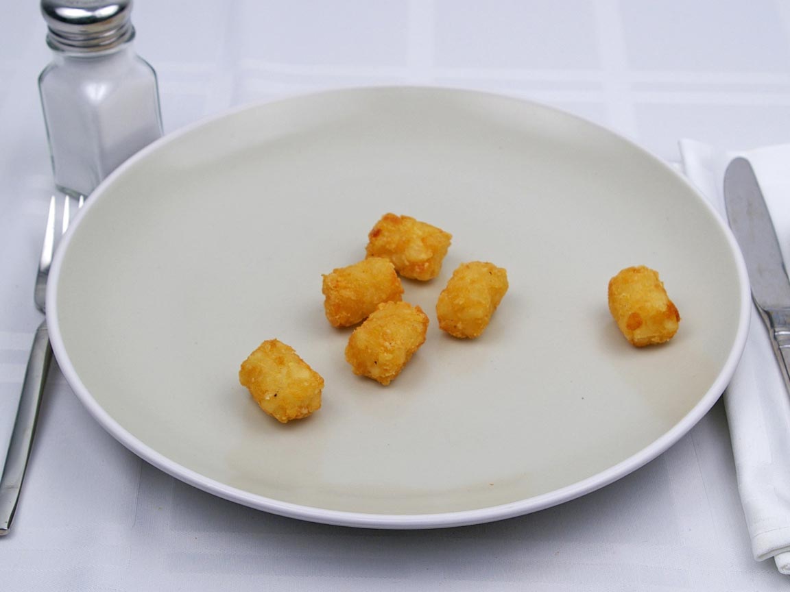 Calories in 51 grams of Tater Tots -Frozen Oven Heated