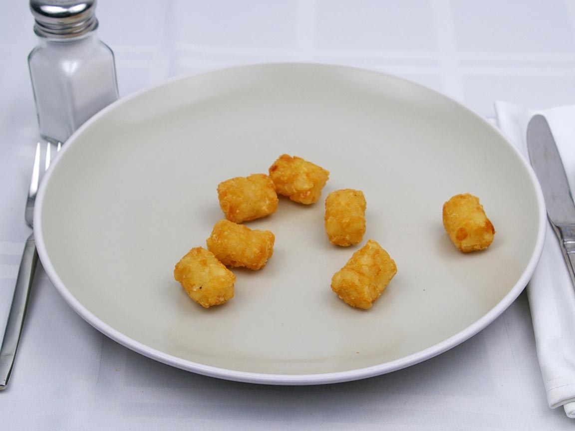 Calories in 59 grams of Tater Tots -Frozen Oven Heated