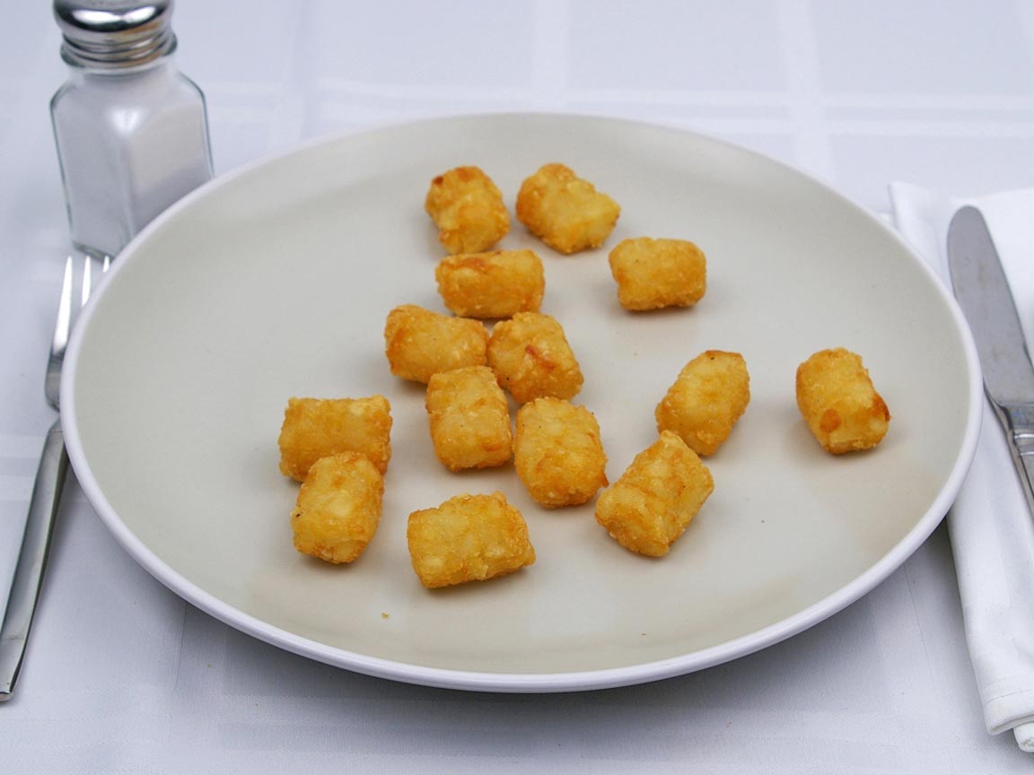 Calories in 119 grams of Tater Tots -Frozen Oven Heated