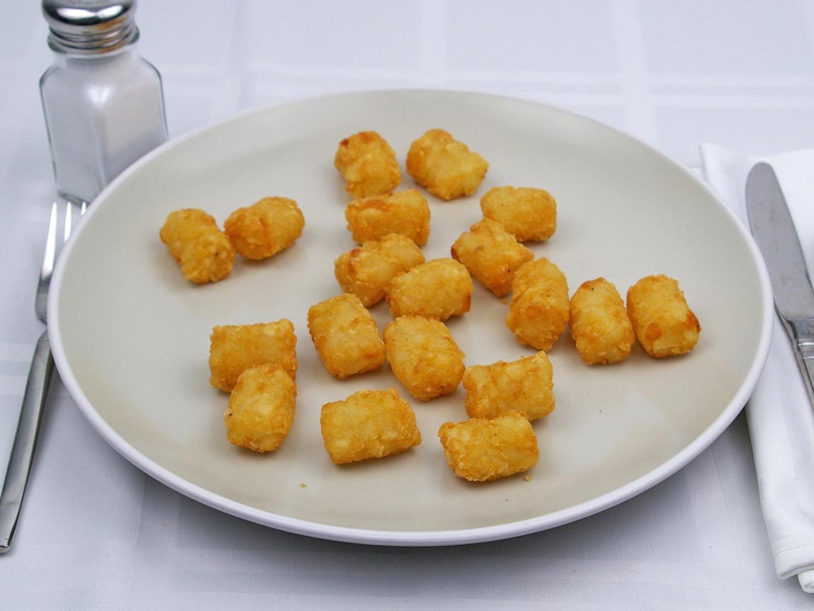 Calories in 161 grams of Tater Tots -Frozen Oven Heated
