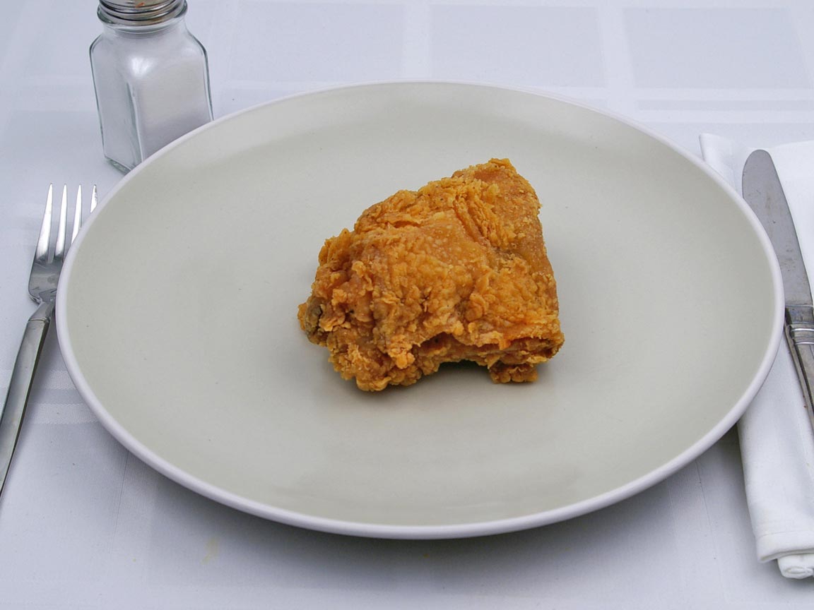 Calories in 1 thigh(s) of Kentucky Fried Chicken - Thigh - Extra Crispy
