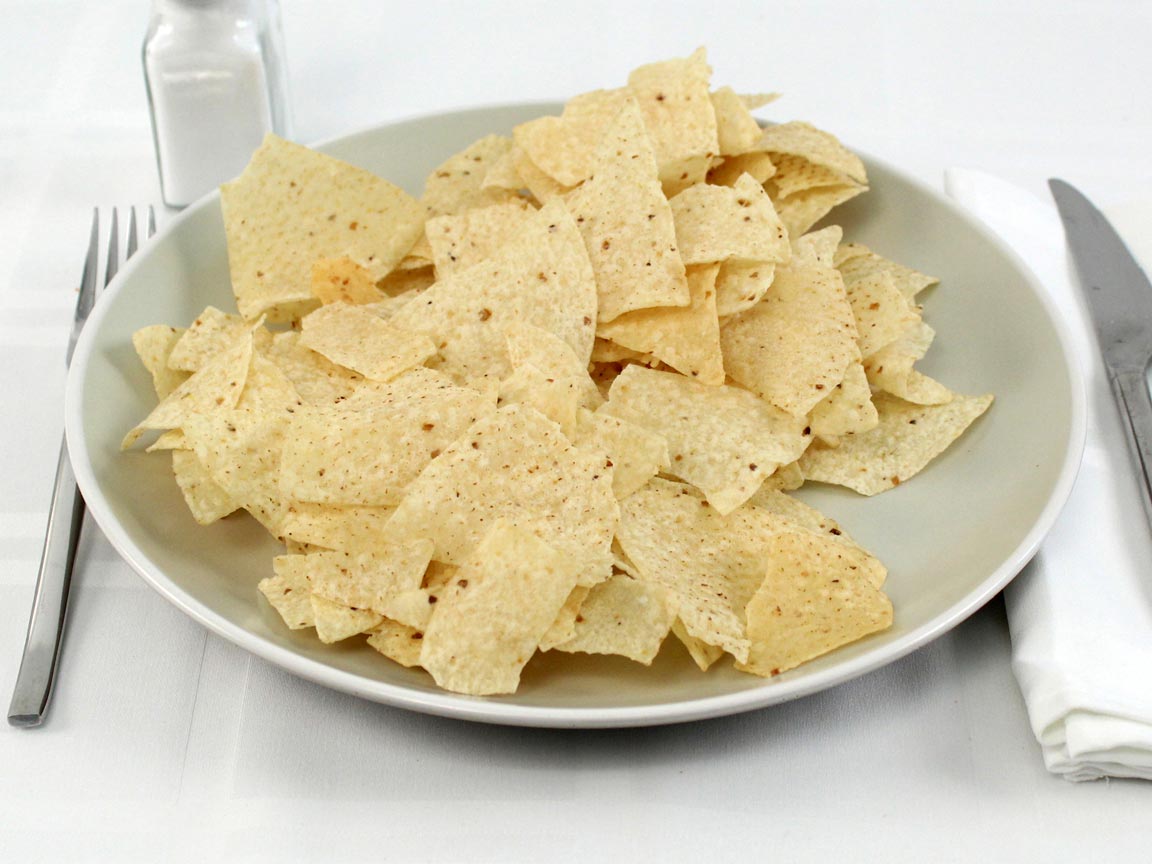 Calories in 85 grams of Cantina Thin Tortilla Chips