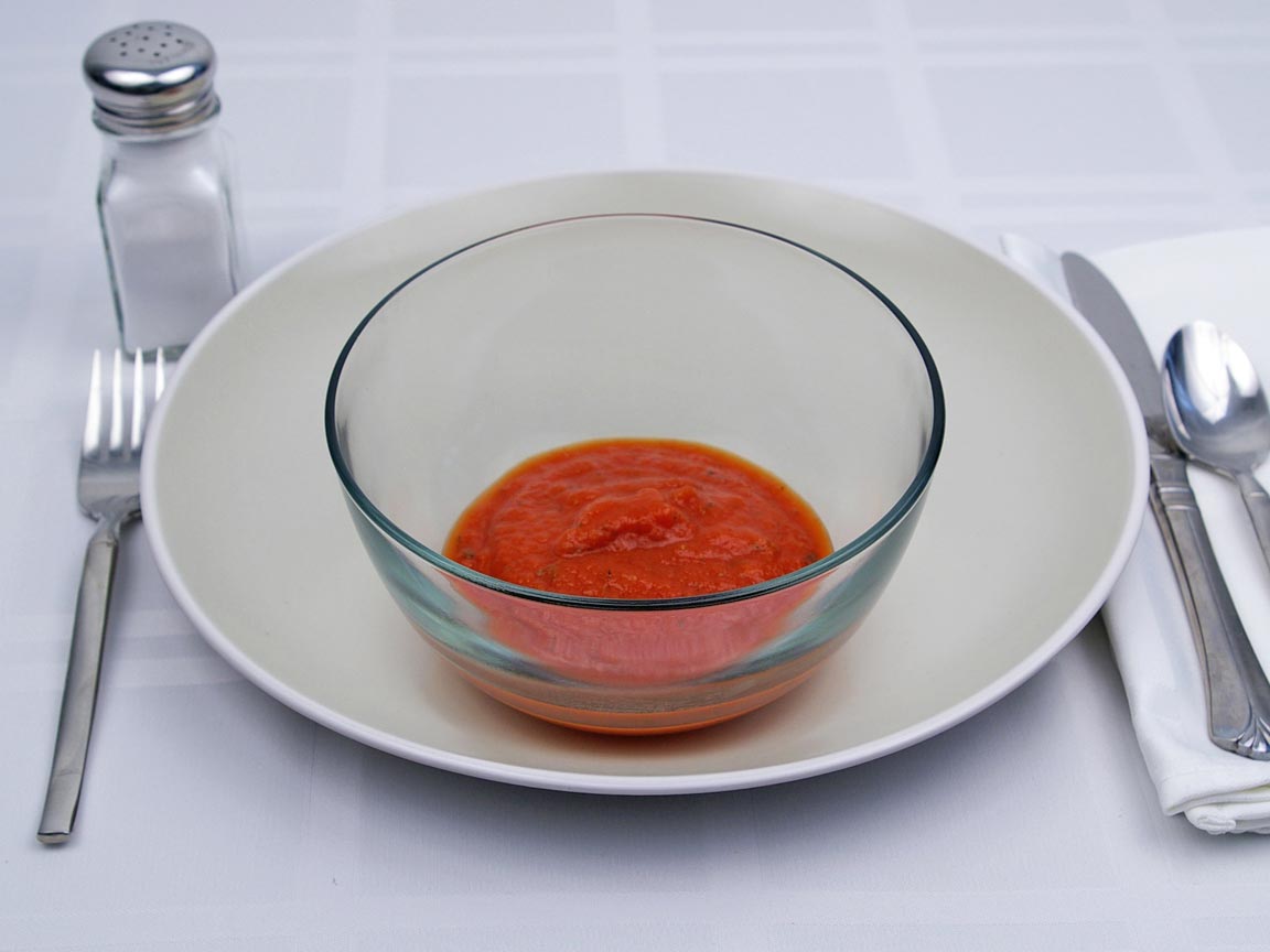 Calories in 0.5 cup(s) of Tomato Sauce