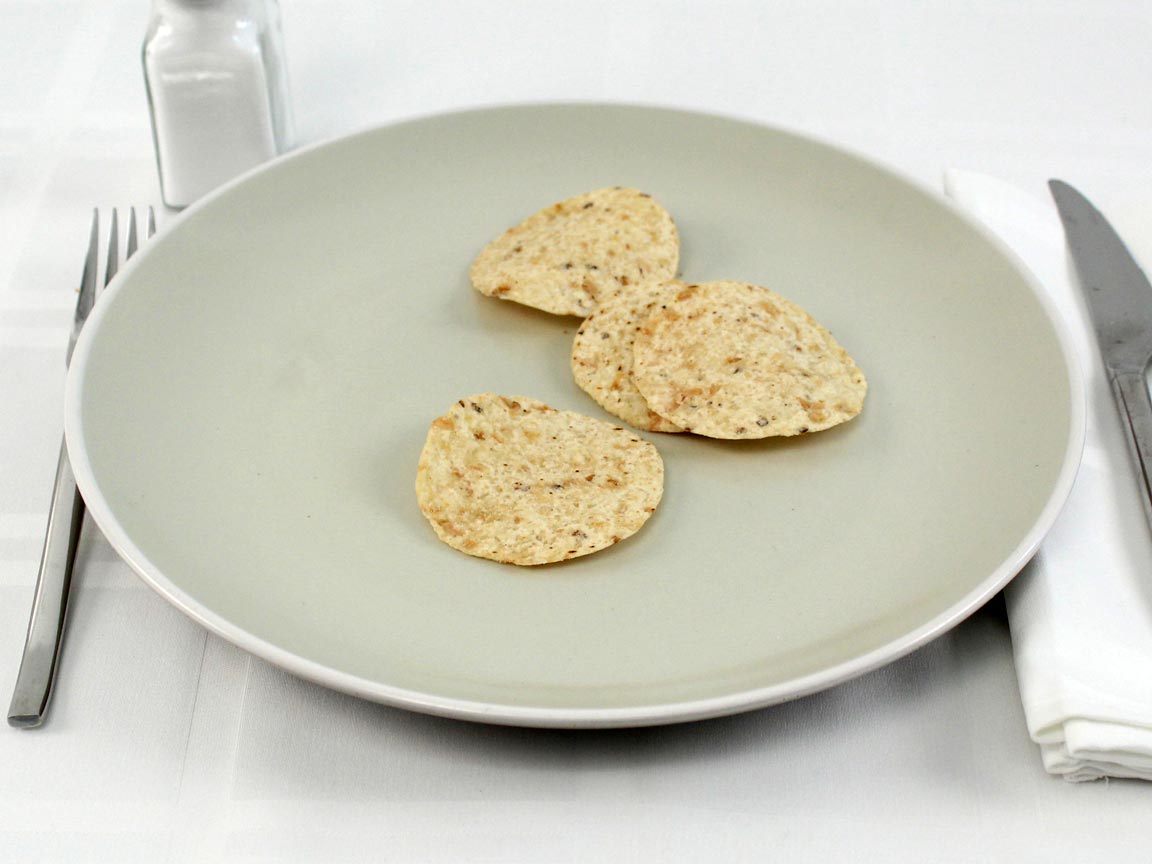 Calories in 14 grams of Tortilla Chips Rounds