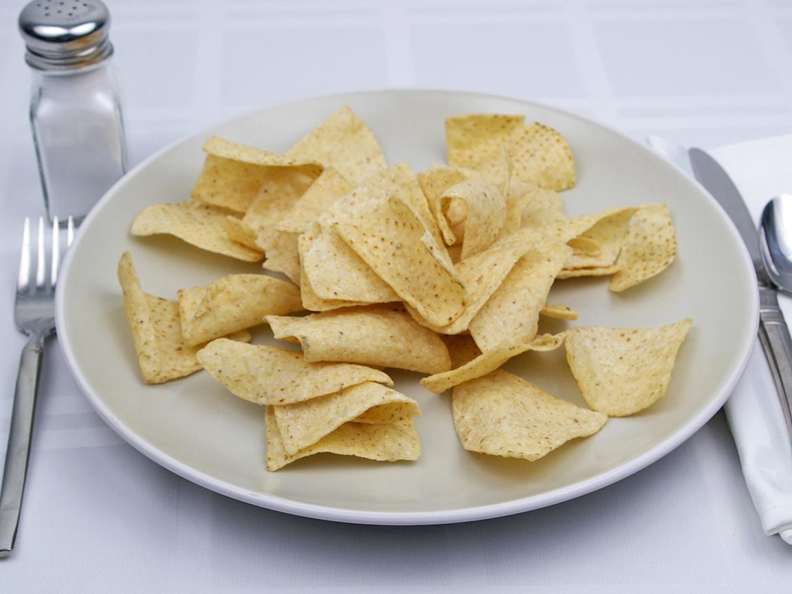 Calories in 70 grams of White Corn Tortilla Chips