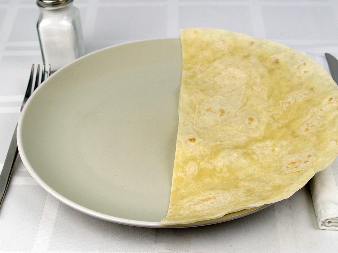 Calories in 0.5 tortilla(s) of Flour Tortilla Extra Large