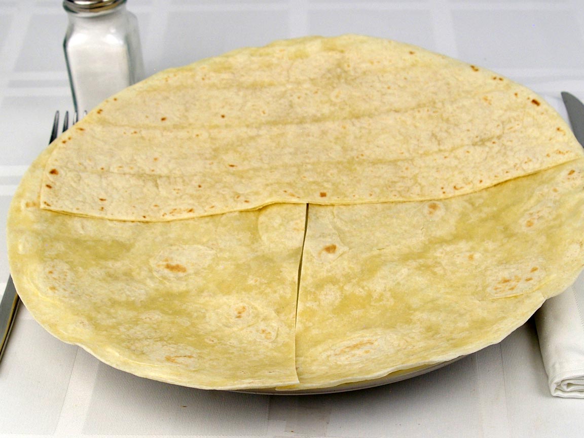 Calories in 1.5 tortilla(s) of Flour Tortilla Extra Large