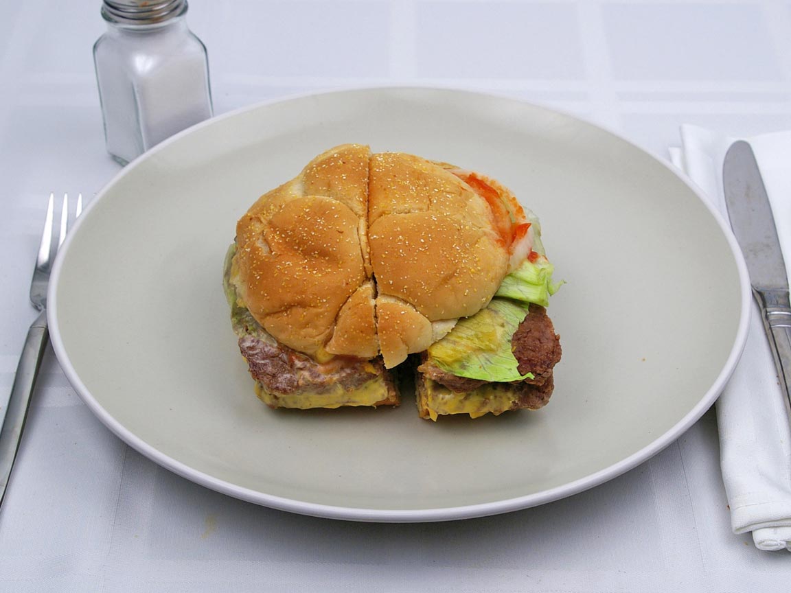Calories in 1 sandwich(es) of Wendy's - Triple Hamburger