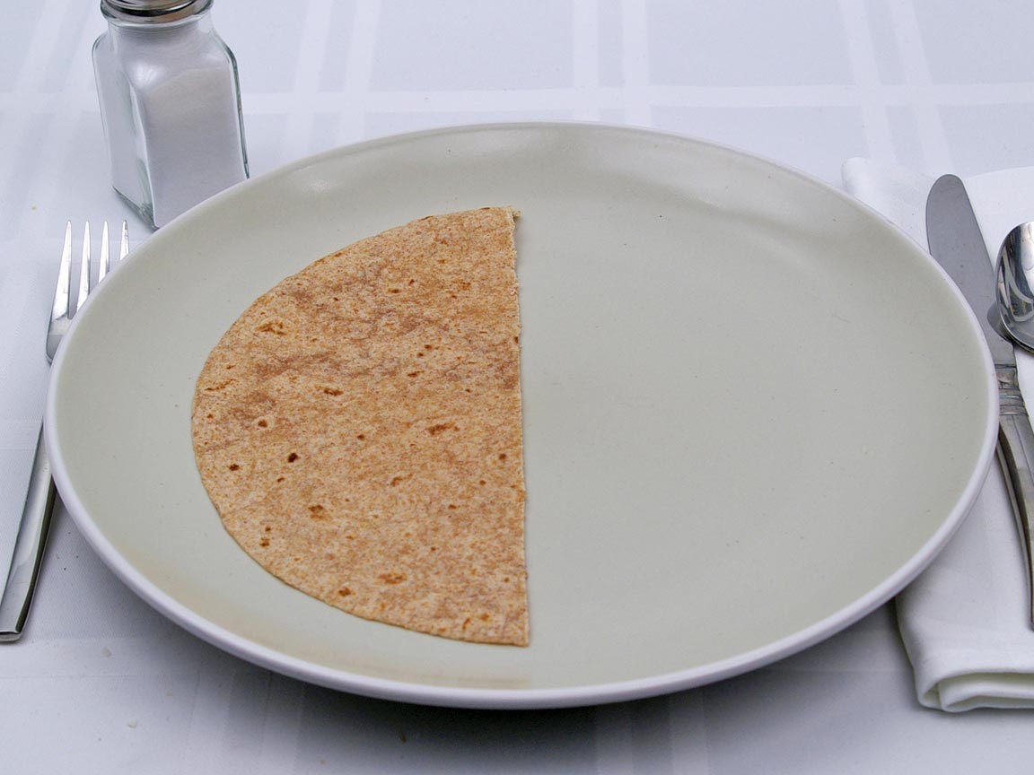 Calories in 0.5 tortilla(s) of Tortillas - Whole Wheat